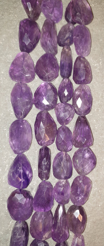 A Amethyst Gemstone Beads. Natural Nugget Faceted  Amethyst Gemstone with strand length 15" size 16x16 - 30x20mm