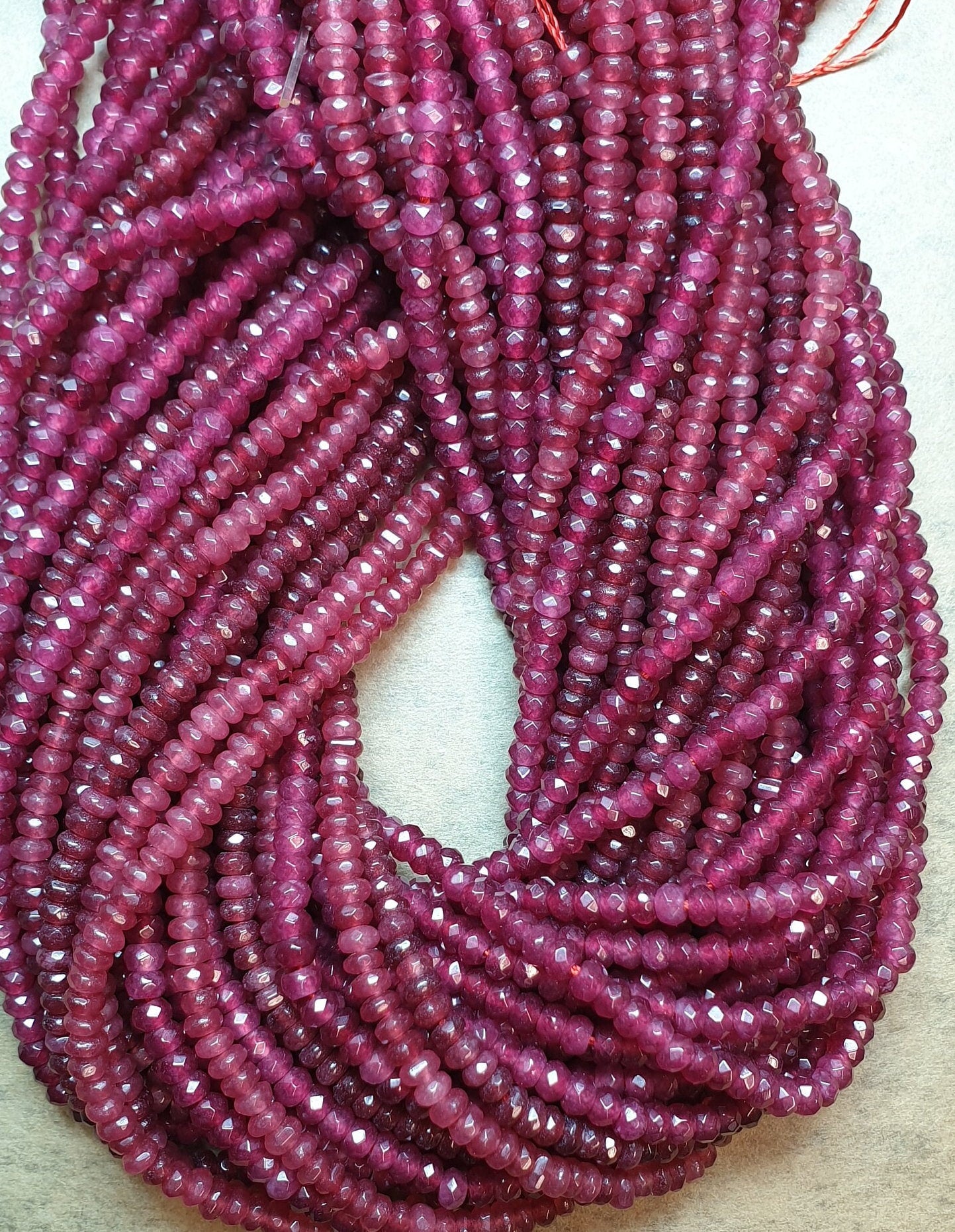 Red Jade Gemstone Beads. Natural Rondelle Red Jade Gemstone with strand length 15" size 4x2mm